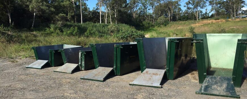 Empty Green Skip Bins