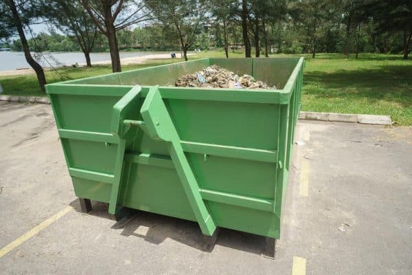 Green Skip Bin With Rubbish